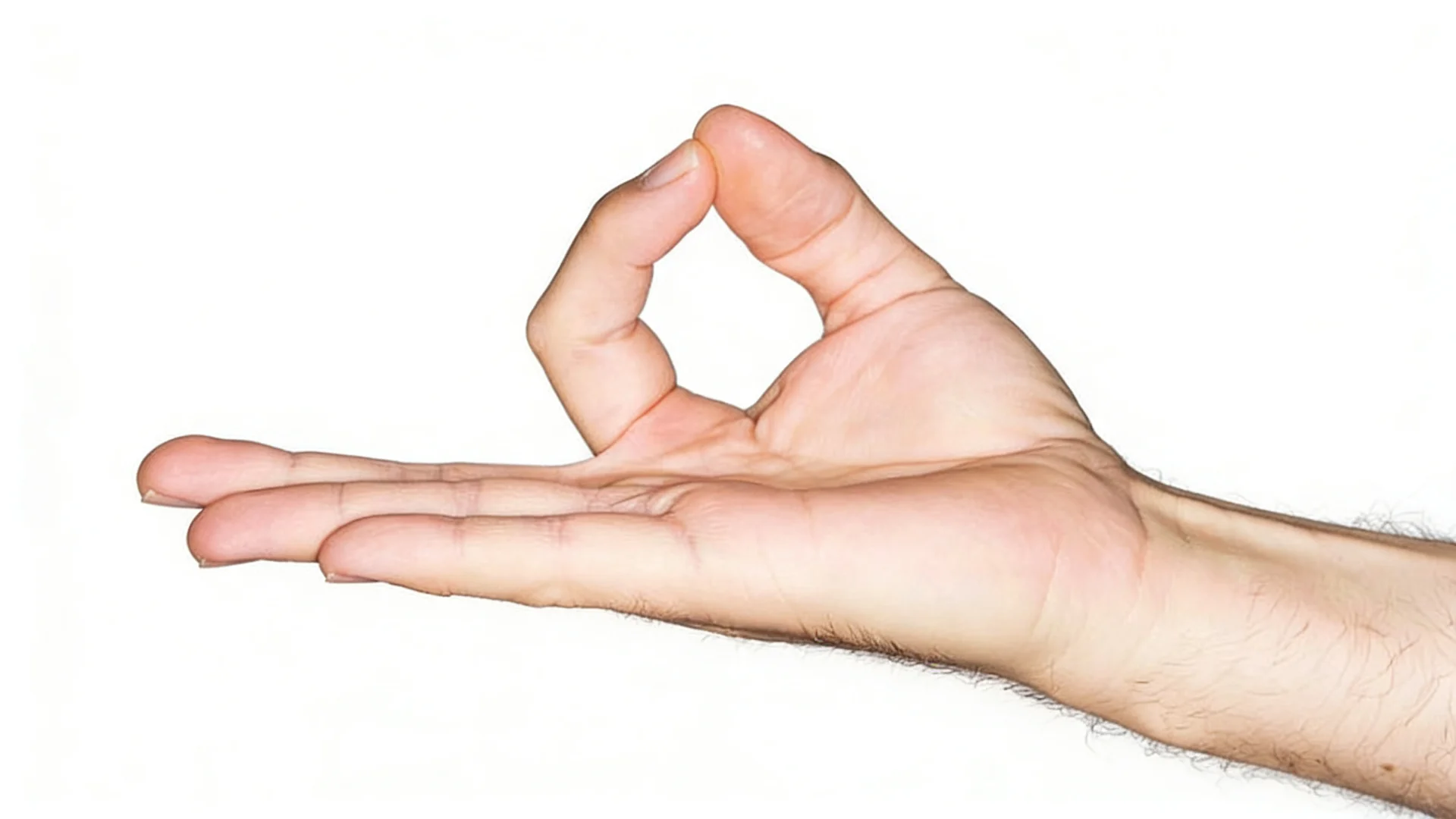 Close-up of a person's hand performing the Gyan mudra gesture, with the tips of the thumb and index finger touching to form a circle.