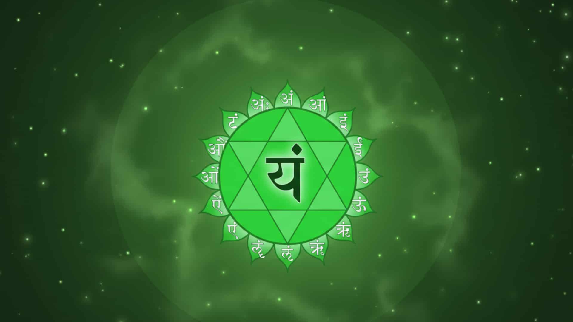 Green Heart Chakra symbol with a twelve-petaled lotus and intersecting triangles against a smoky green background.